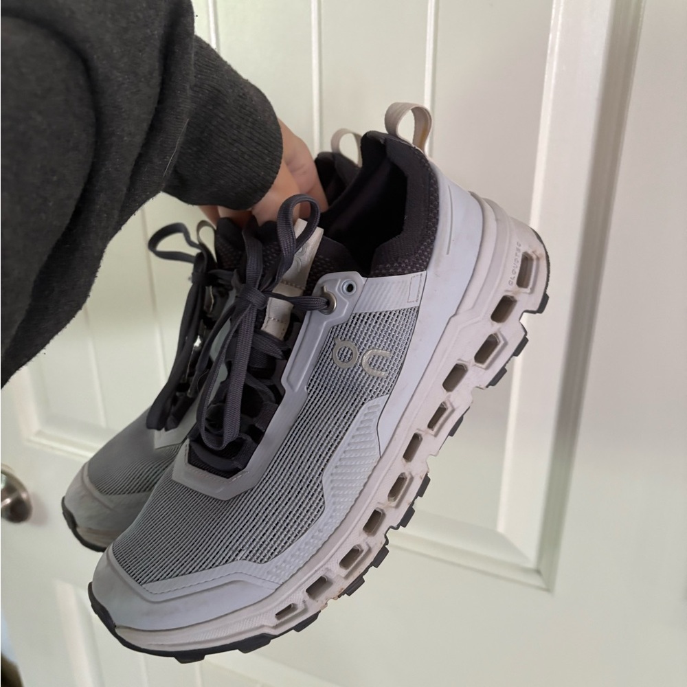 On Running Athletic Shoes in White and Black